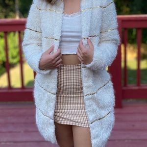 Lightweight gold lines and white jacket